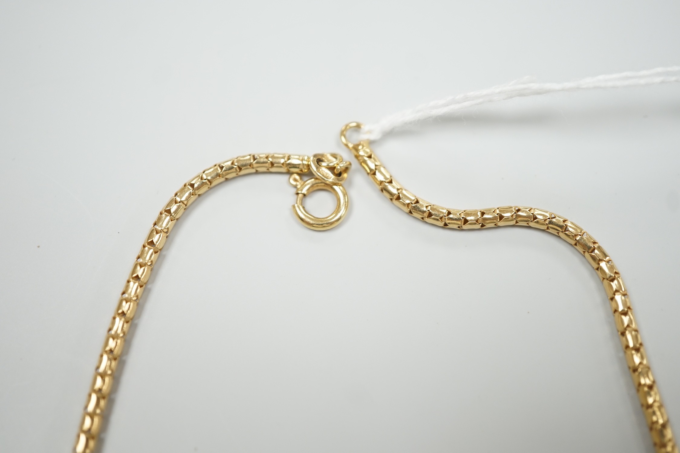 A modern 18ct gold three strand necklace, 43cm, 15.5 grams.